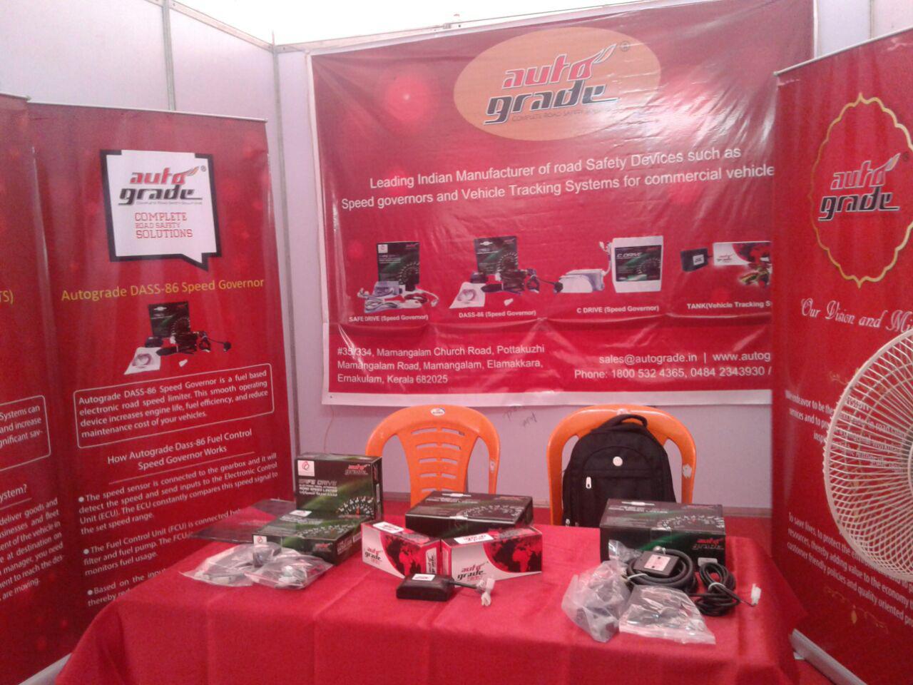 Autograde’s stall displaying speed governors at a road safety event in Thiruvananthapuram.  